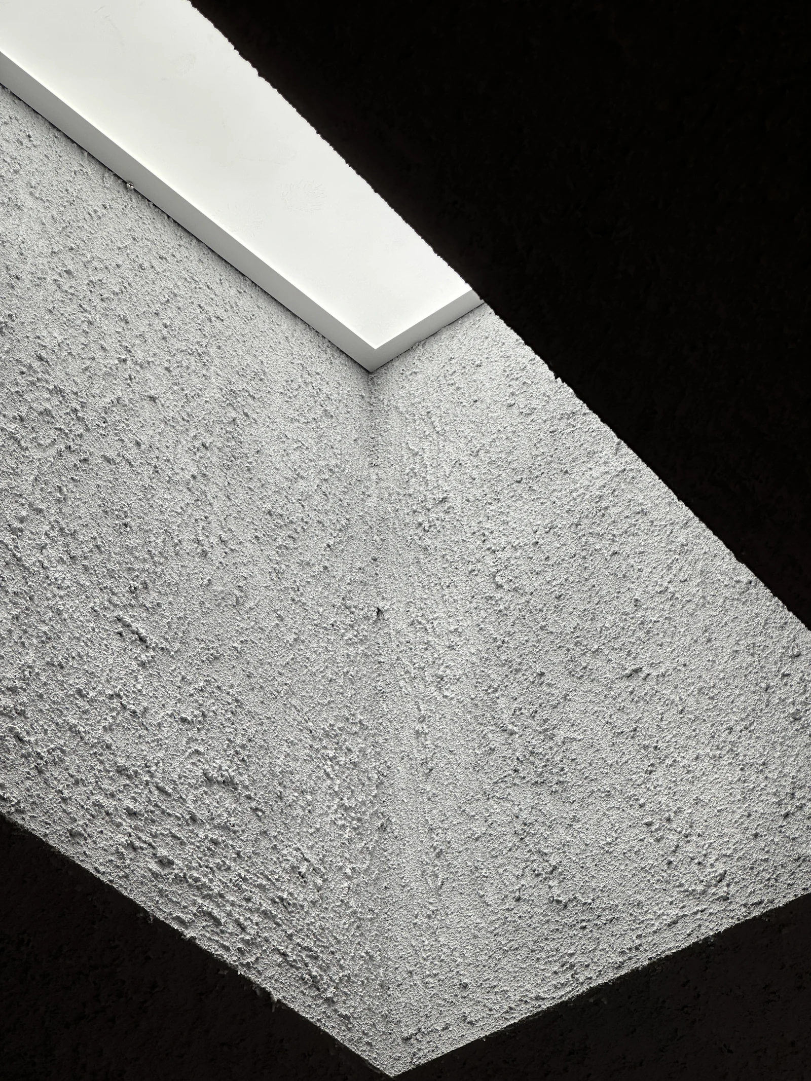 Light meeting the textured wall surface